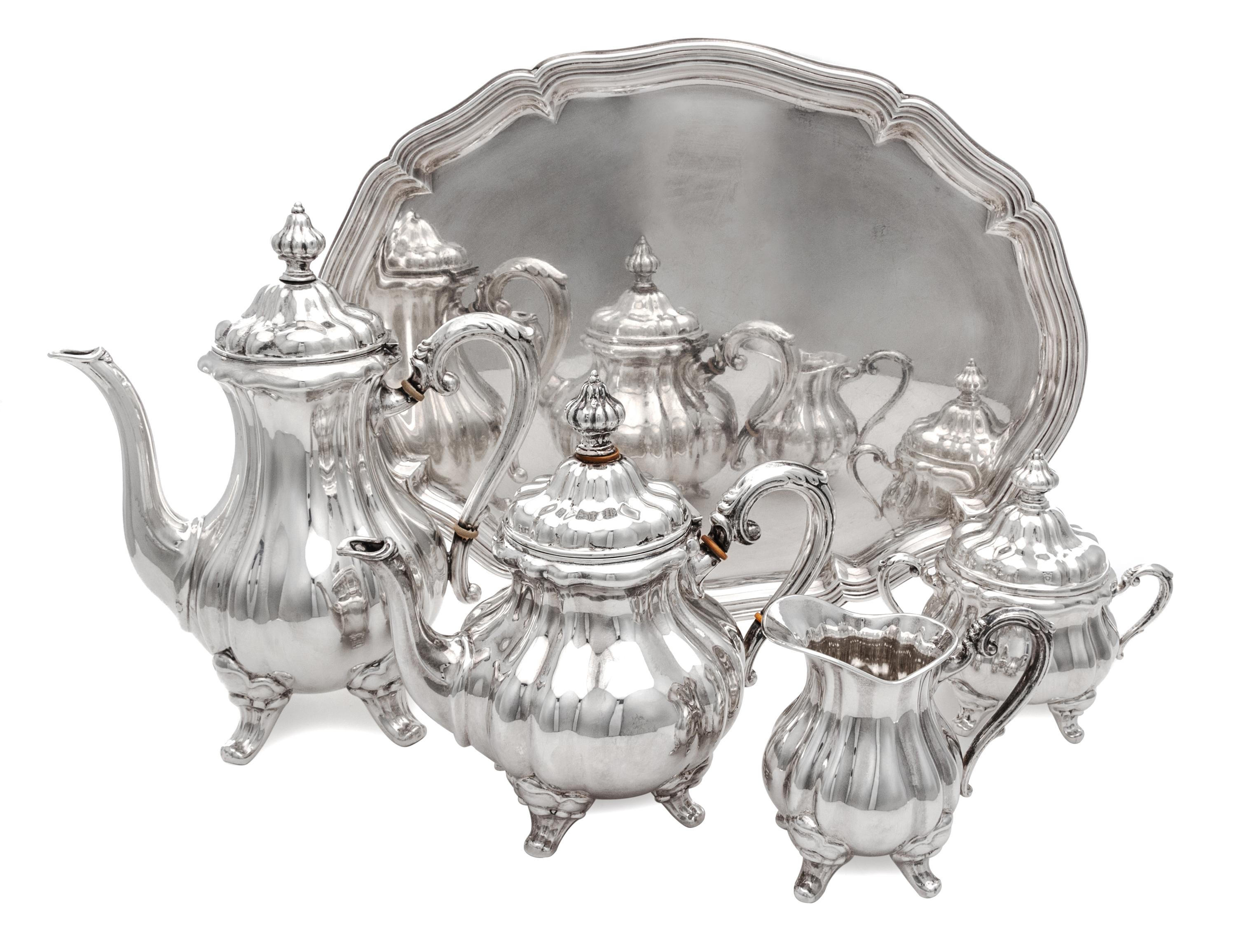 A German Silver Five-Piece Tea and Coffee Service, Gebruder Kuhn, Schwabisch Gmund, Early 20th Century, comprising a coffee pot, teapot