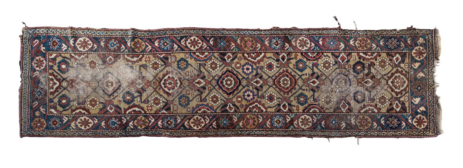 A Kurdish Wool Runner 10 feet 11 inches x 3 feet.