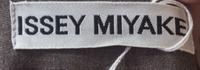 An Issey Miyake Grey Wool Skirt Ensemble, Size M.