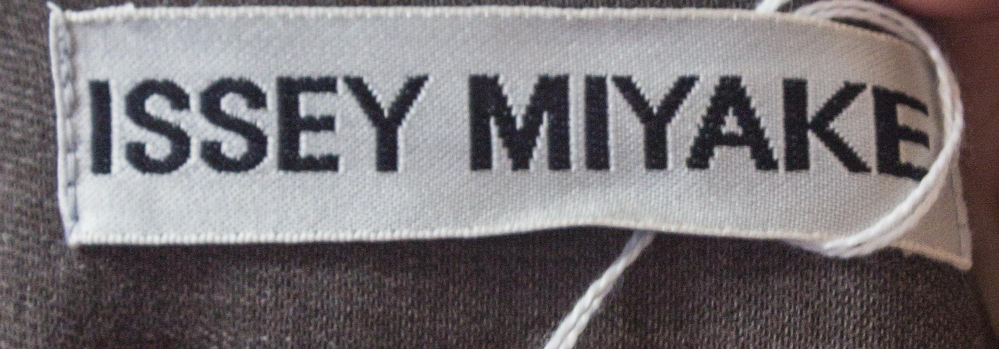 An Issey Miyake Grey Wool Skirt Ensemble, Size M.