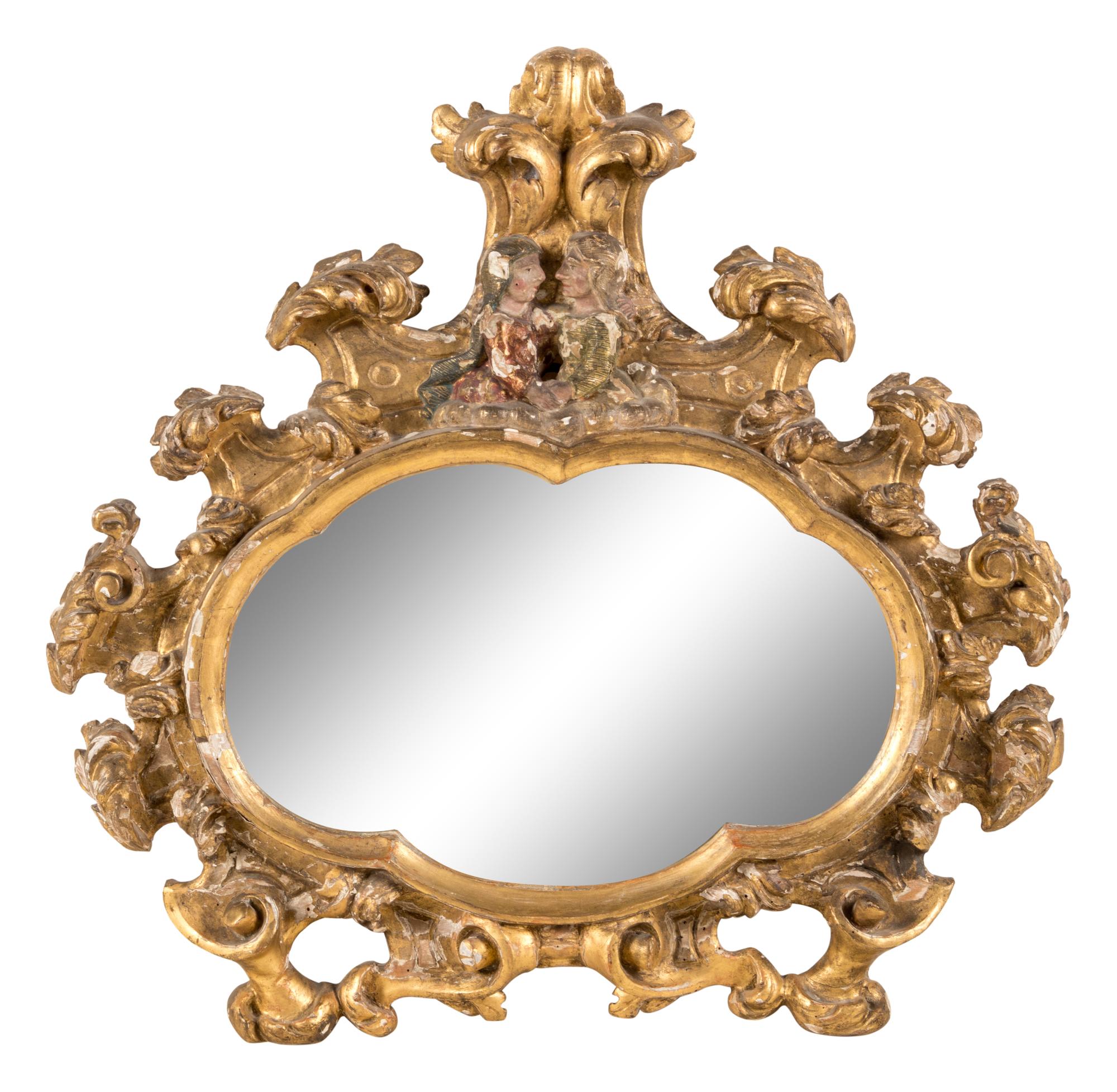A Continental Rococo Carved and Polychrome Decorated Giltwood Courting Mirror