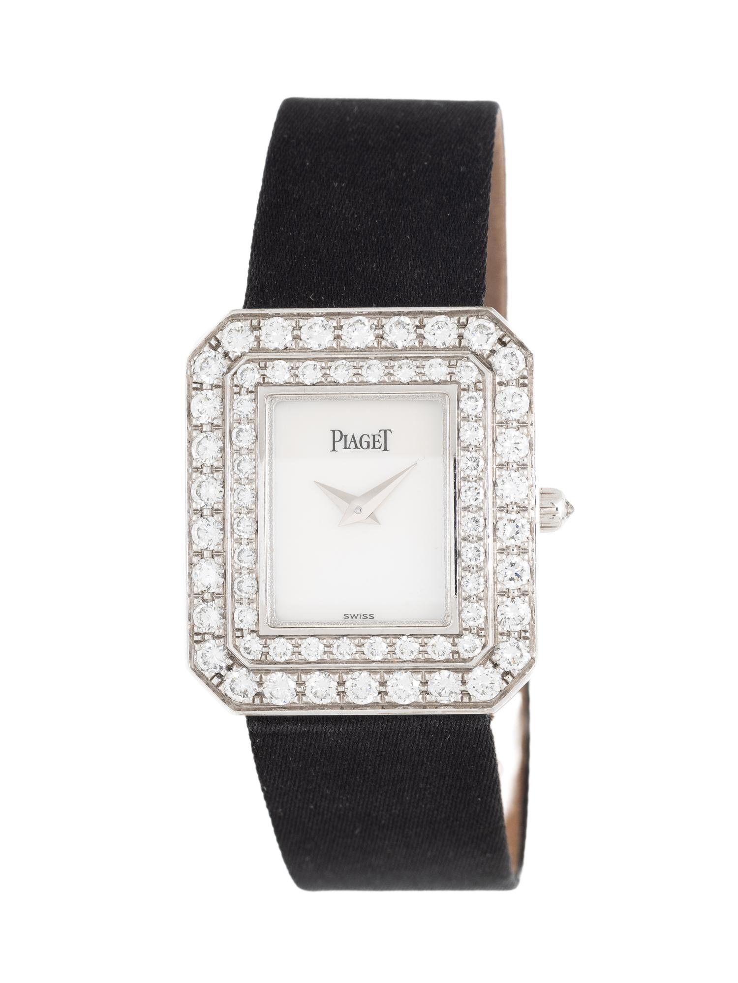PIAGET, REF. 51165 18K WHITE GOLD AND DIAMOND WITH MOTHER-OF-PEARL FACTORY DIAMOND BEZEL 'PROTOCOLE' WATCH, ORIGINAL RECEIPT