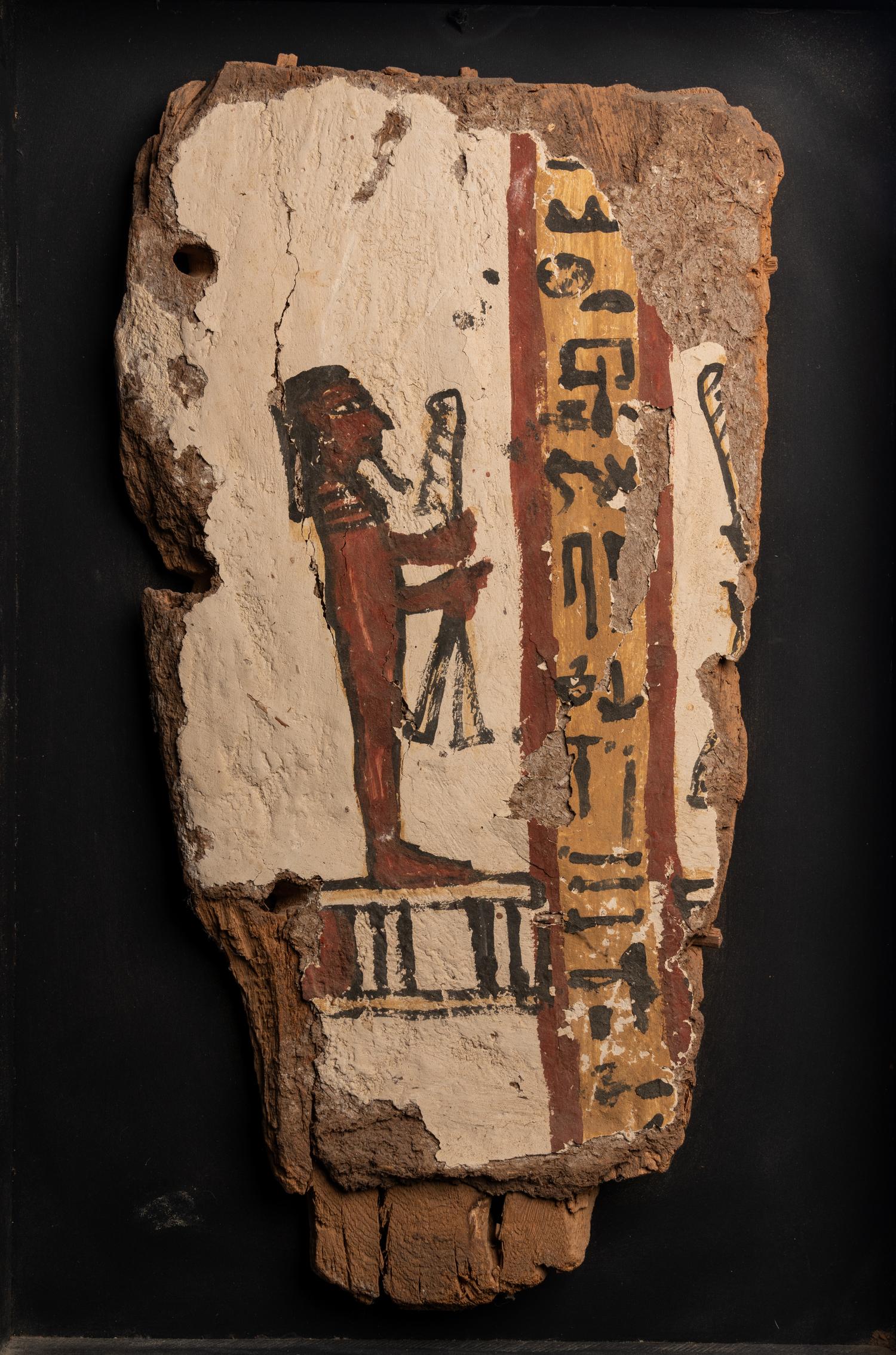 An Egyptian Painted Wood Sarcophagus Fragment