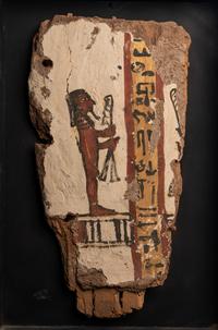 An Egyptian Painted Wood Sarcophagus Fragment