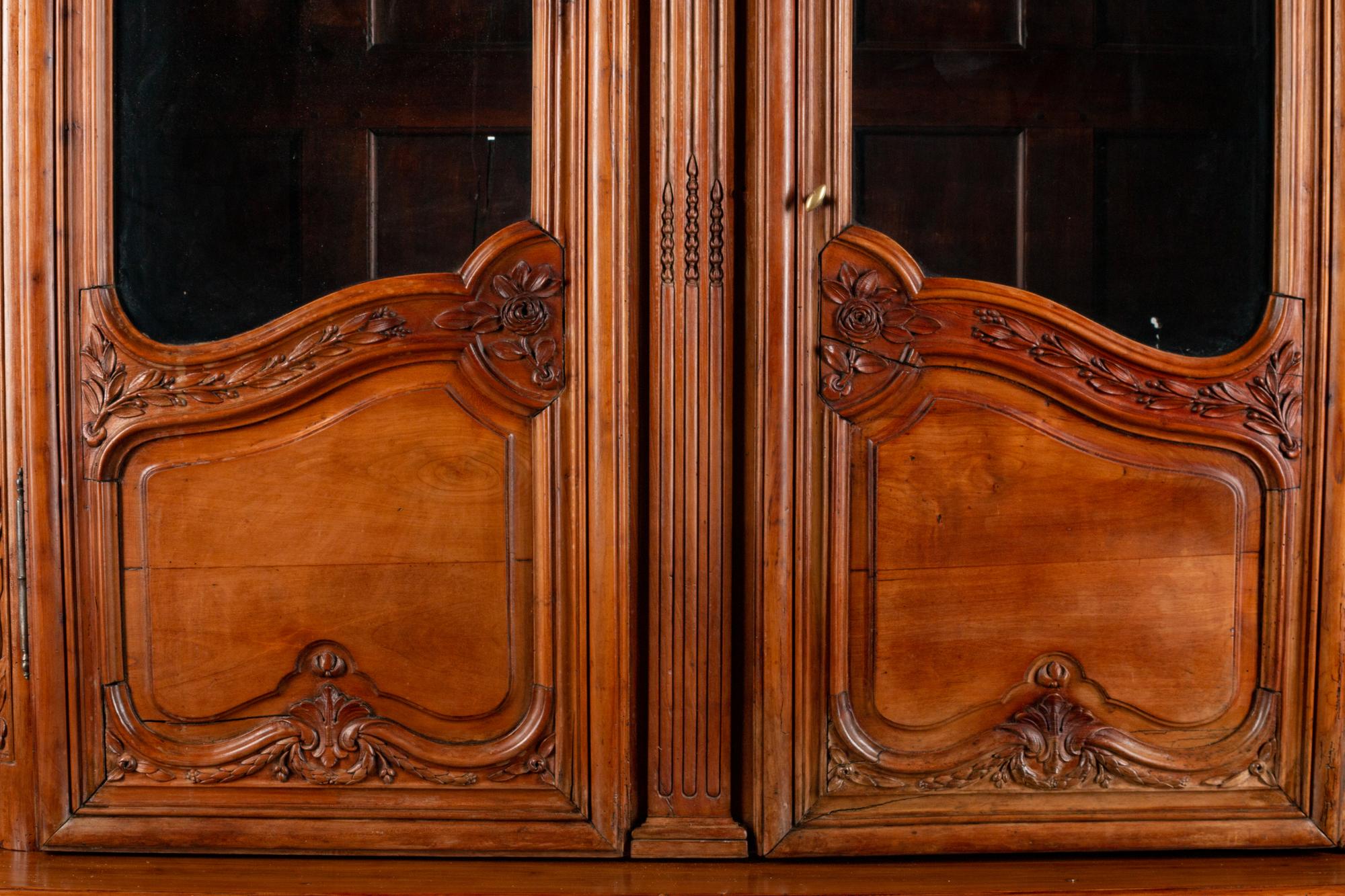 A Louis XV Provincial Walnut Buffet a Deux Corps — SECOND HALF 18TH CENTURY