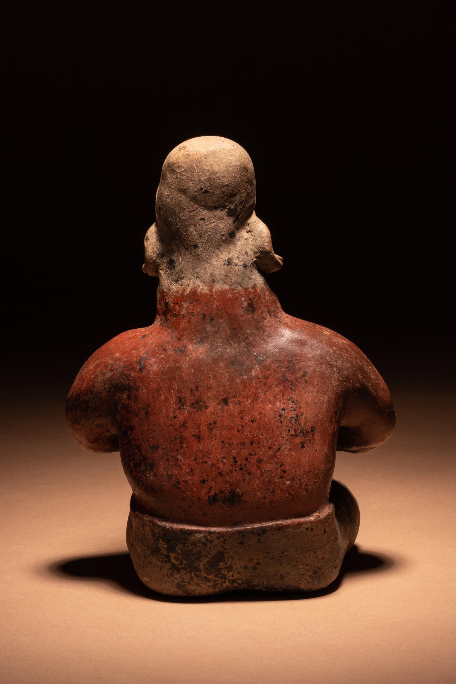 A Jalisco Kneeling Female Figure with Infant