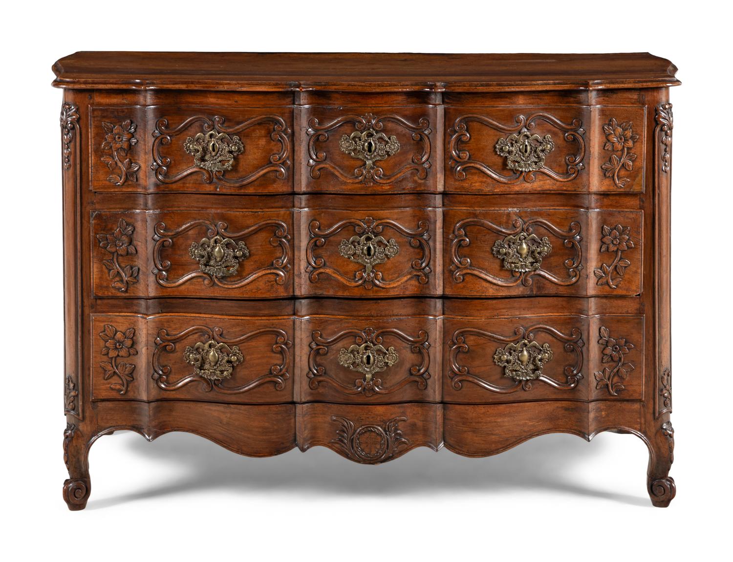 A Louis XV Walnut Serpentine Front Commode