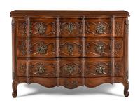 A Louis XV Walnut Serpentine Front Commode