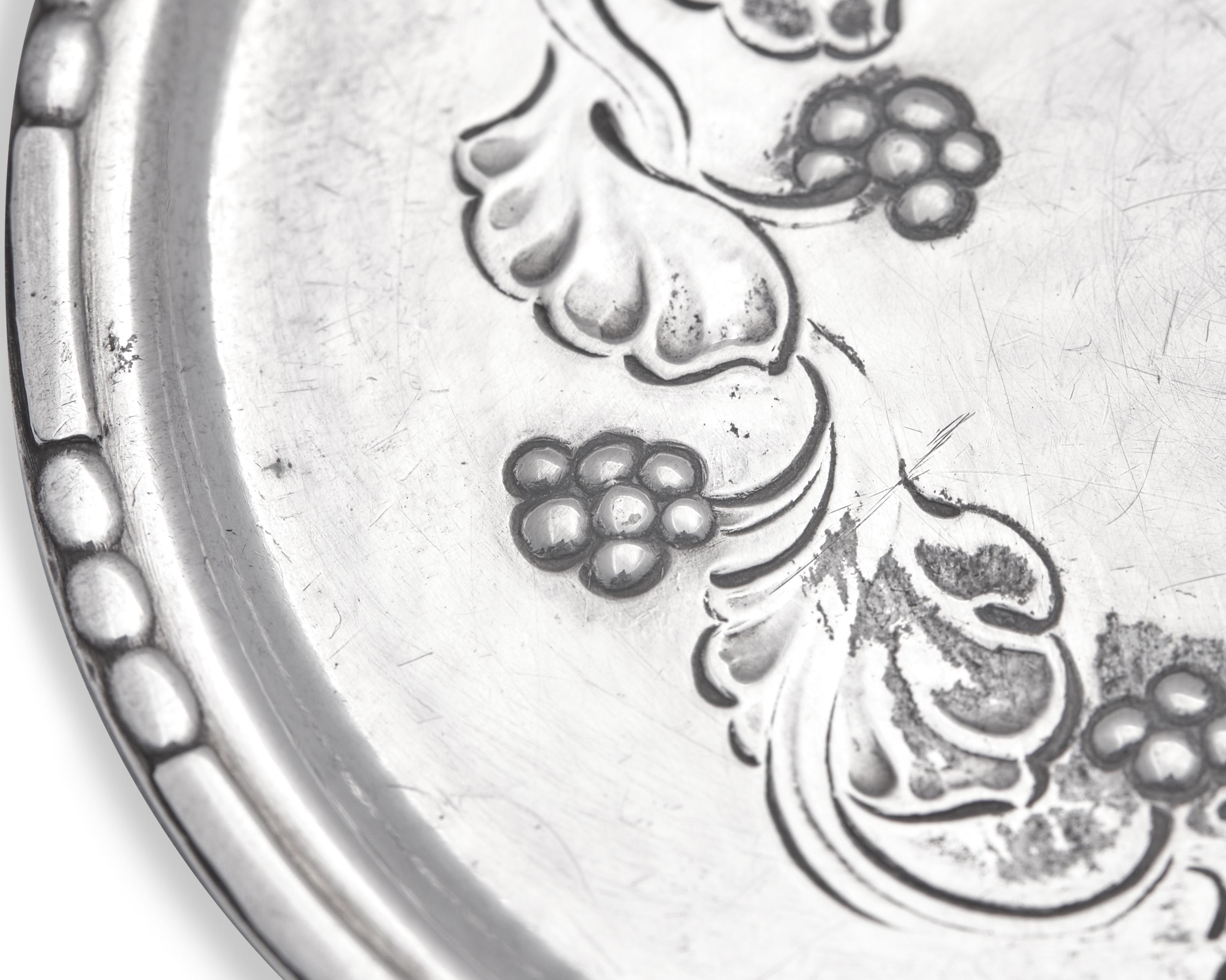 A Set of Twelve Georg Jensen Silver Coasters