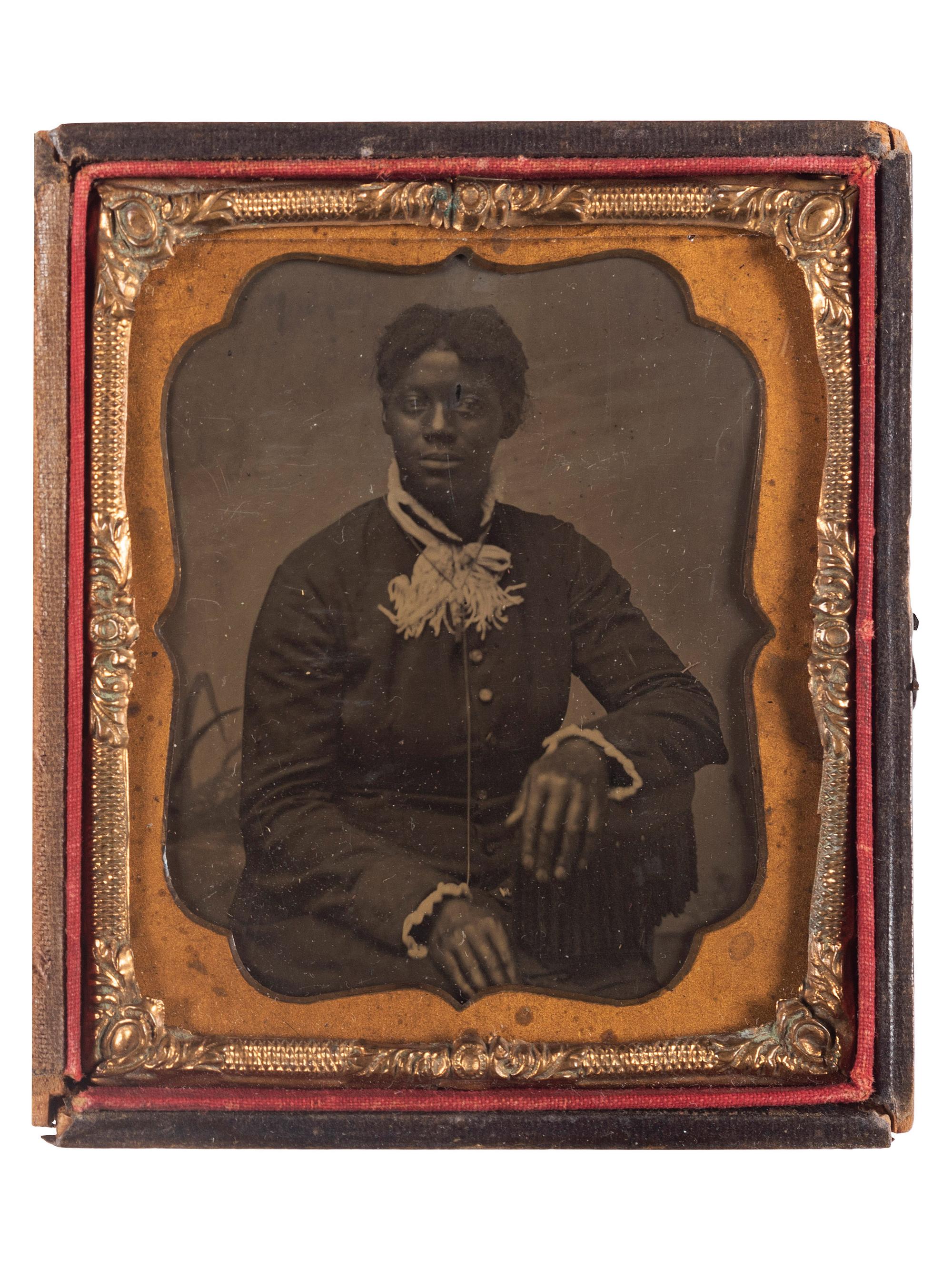 [AFRICAN AMERICANA] -- [EARLY PHOTOGRAPHY]. A group of 3 photographs of African American subjects, incl. tintypes and brooch.