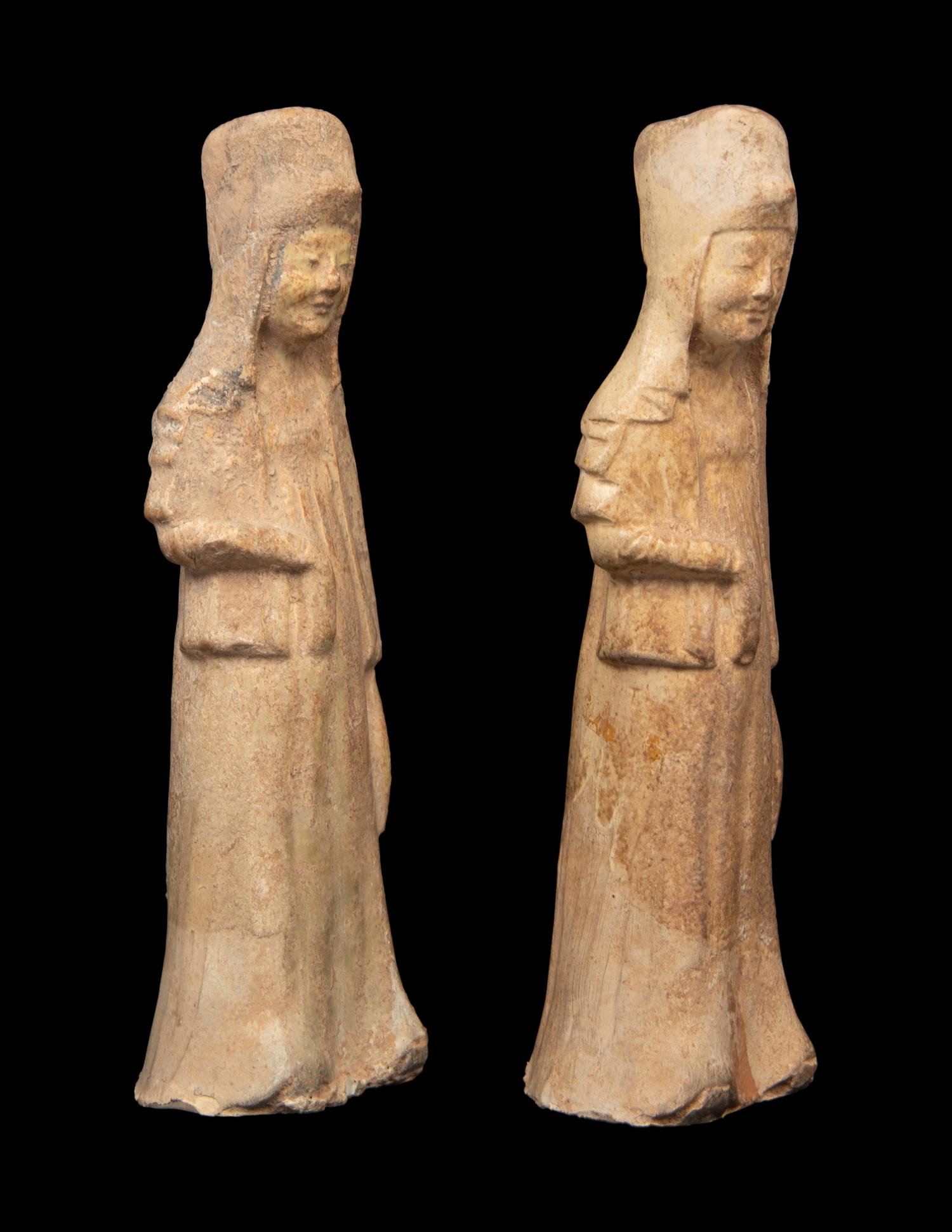 A Pair of Chinese Painted Pottery Figures of Ladies