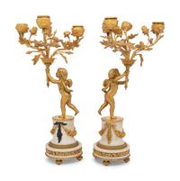 A Pair of Louis XV Style Gilt Bronze and Marble Three-Light Candelabra