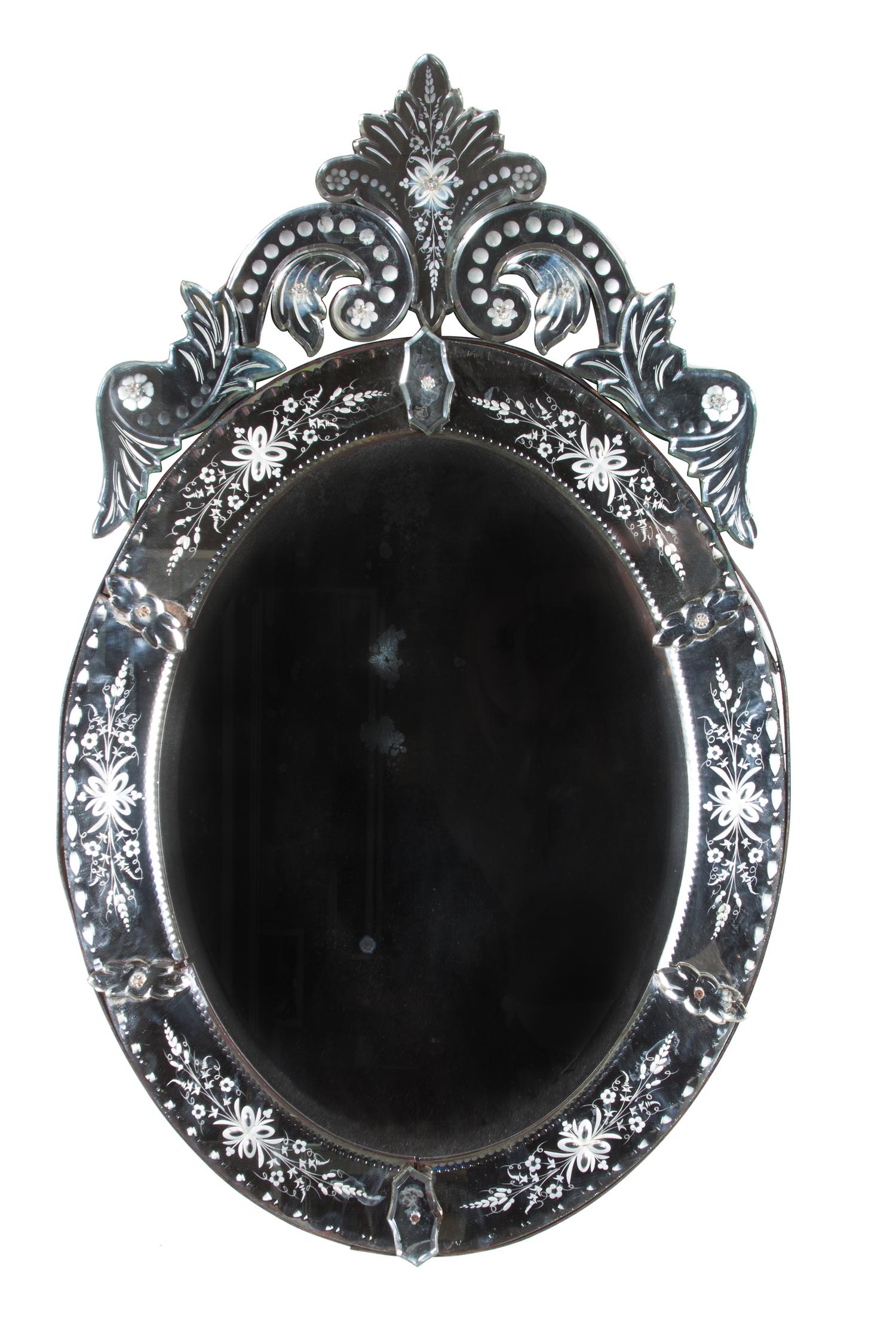 A Venetian Glass Mirror Height 36 1/4 x width 22 inches.