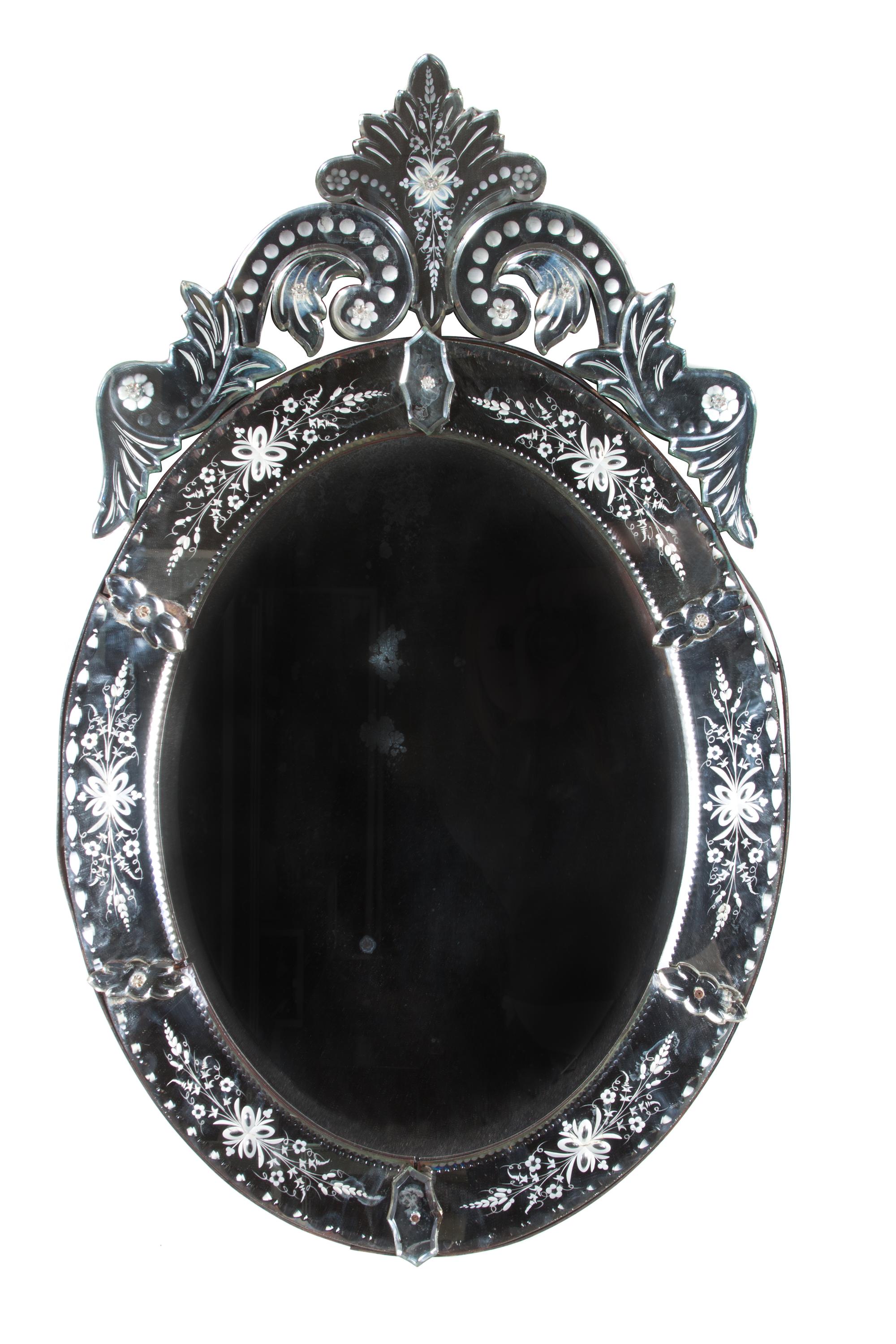 A Venetian Glass Mirror Height 36 1/4 x width 22 inches.