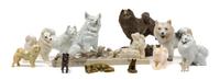 A Group of Thirteen Samoyed Figures Width of widest 9 1/8 inches.