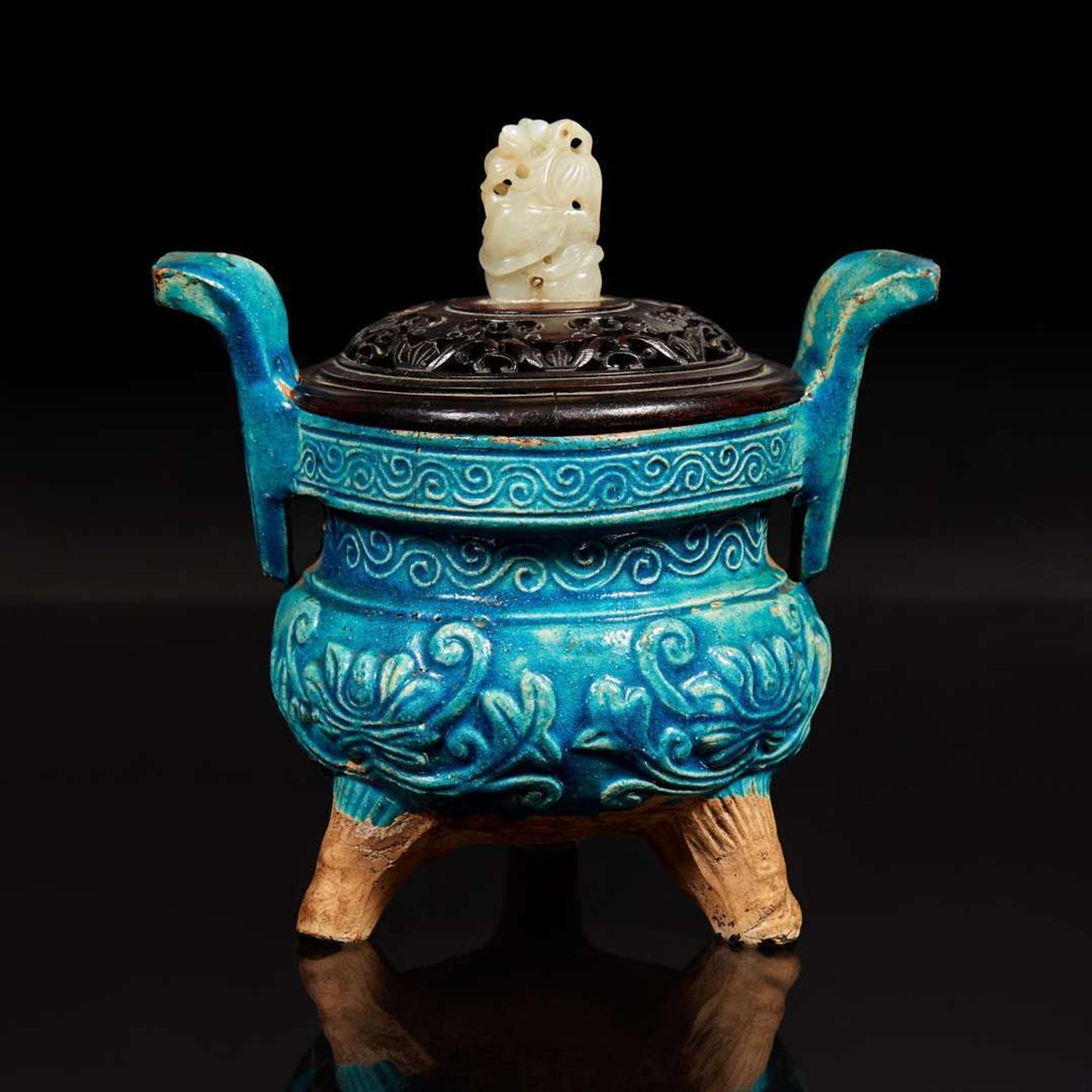 A Chinese turquoise-glazed tripod censer with carved wood cover and jade finial 松石綠地嵌玉鈕帶蓋小香爐