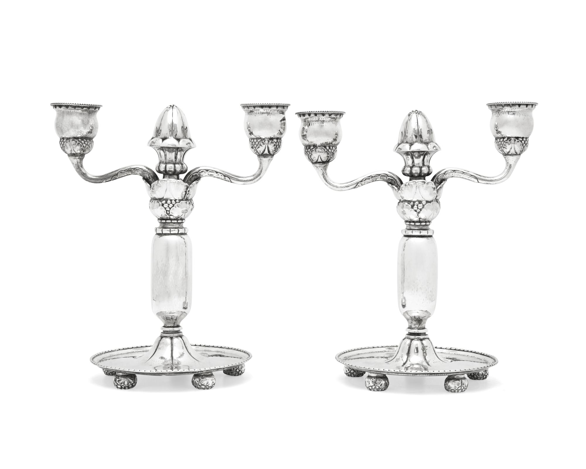 A Pair of Georg Jensen Silver Two-Light Candelabra