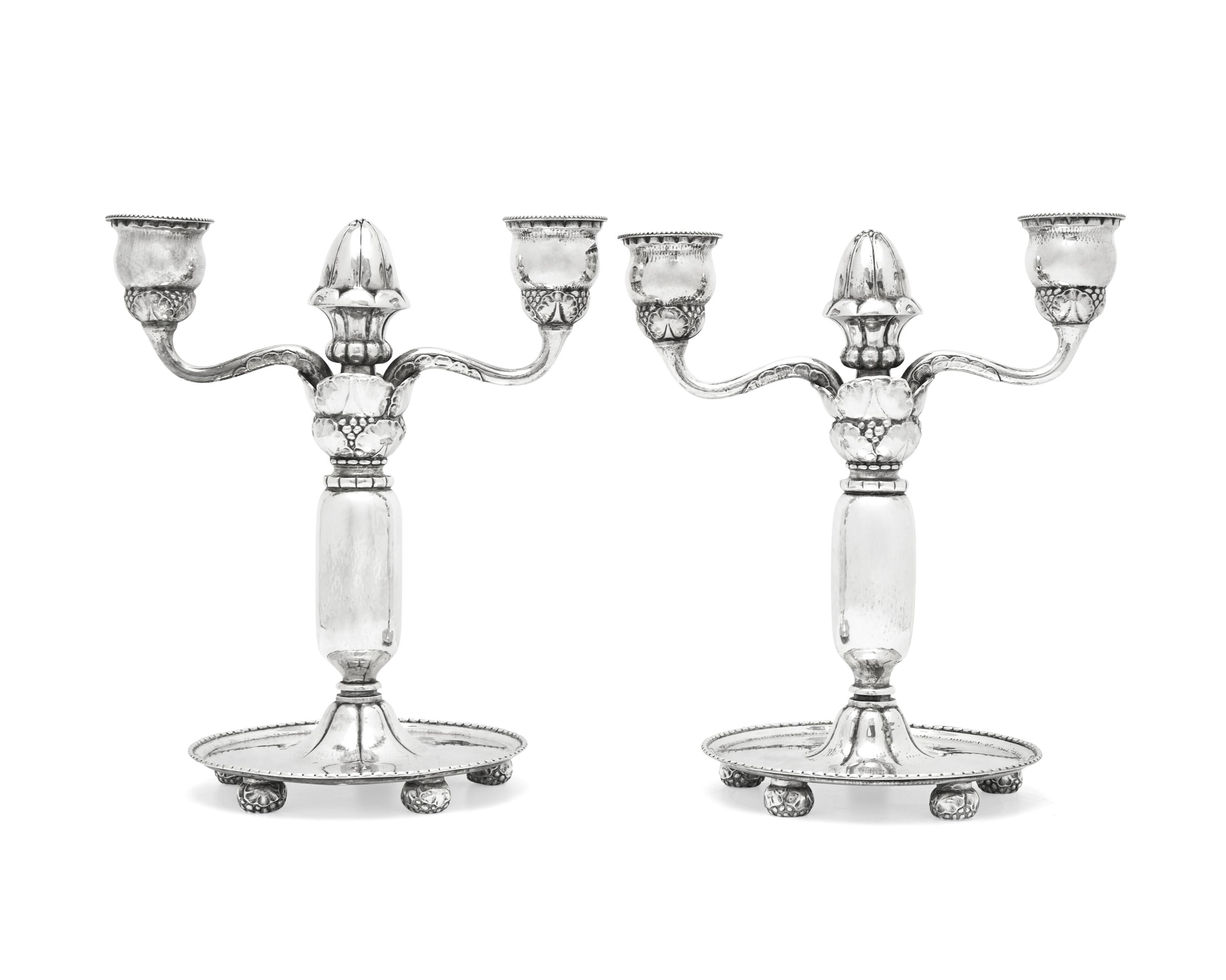 A Pair of Georg Jensen Silver Two-Light Candelabra