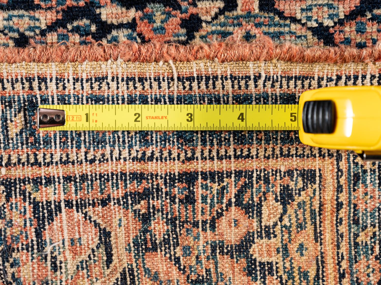 A Persian Senneh Wool Rug