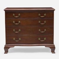A Chippendale carved serpentine mahogany chest of drawers Possibly Rhode Island, late 18th century