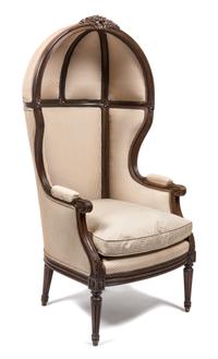 A Louis XVI Style Walnut Porter's Chair Height 55 inches. — 19TH CENTURY