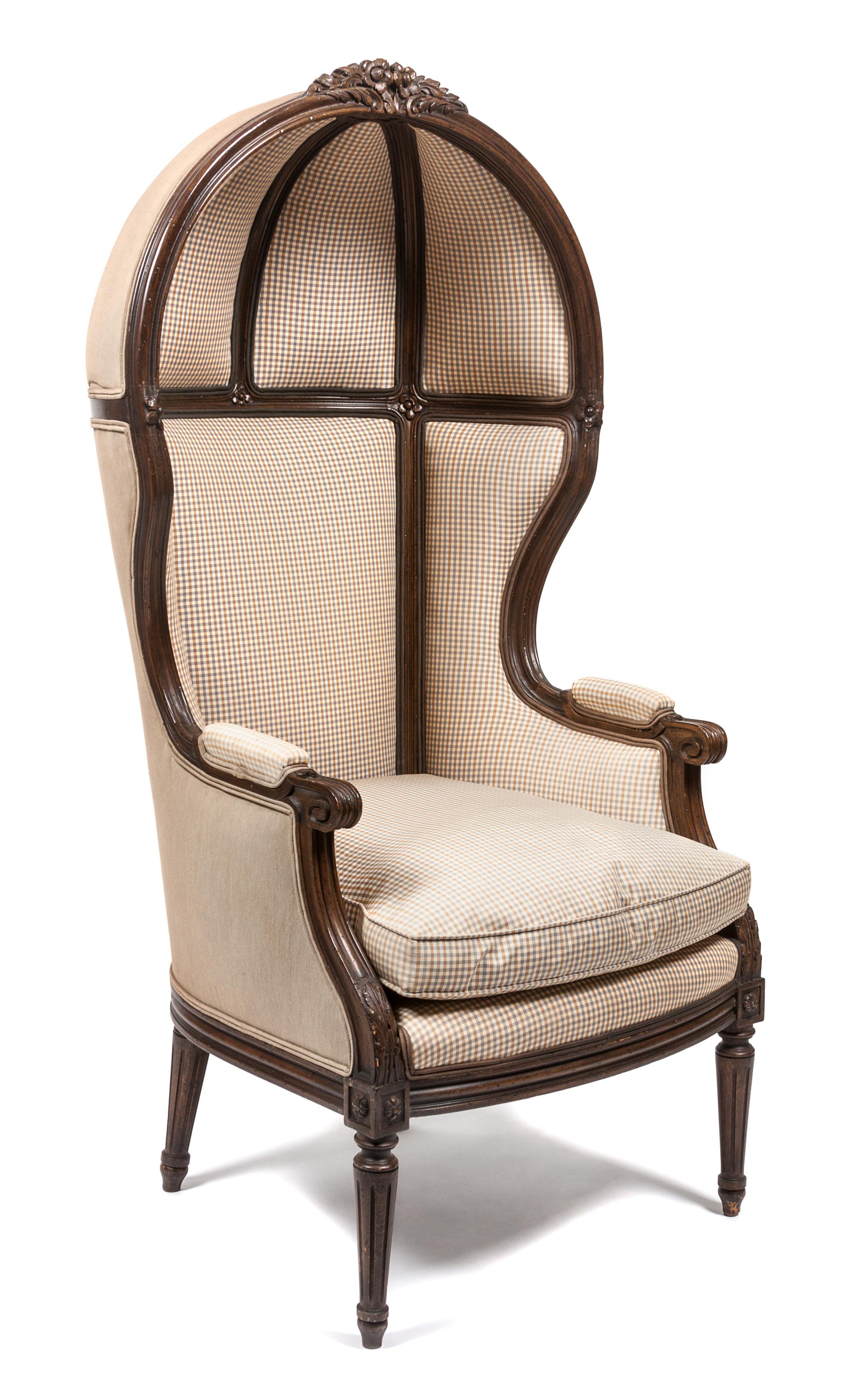 A Louis XVI Style Walnut Porter's Chair Height 55 inches. — 19TH CENTURY