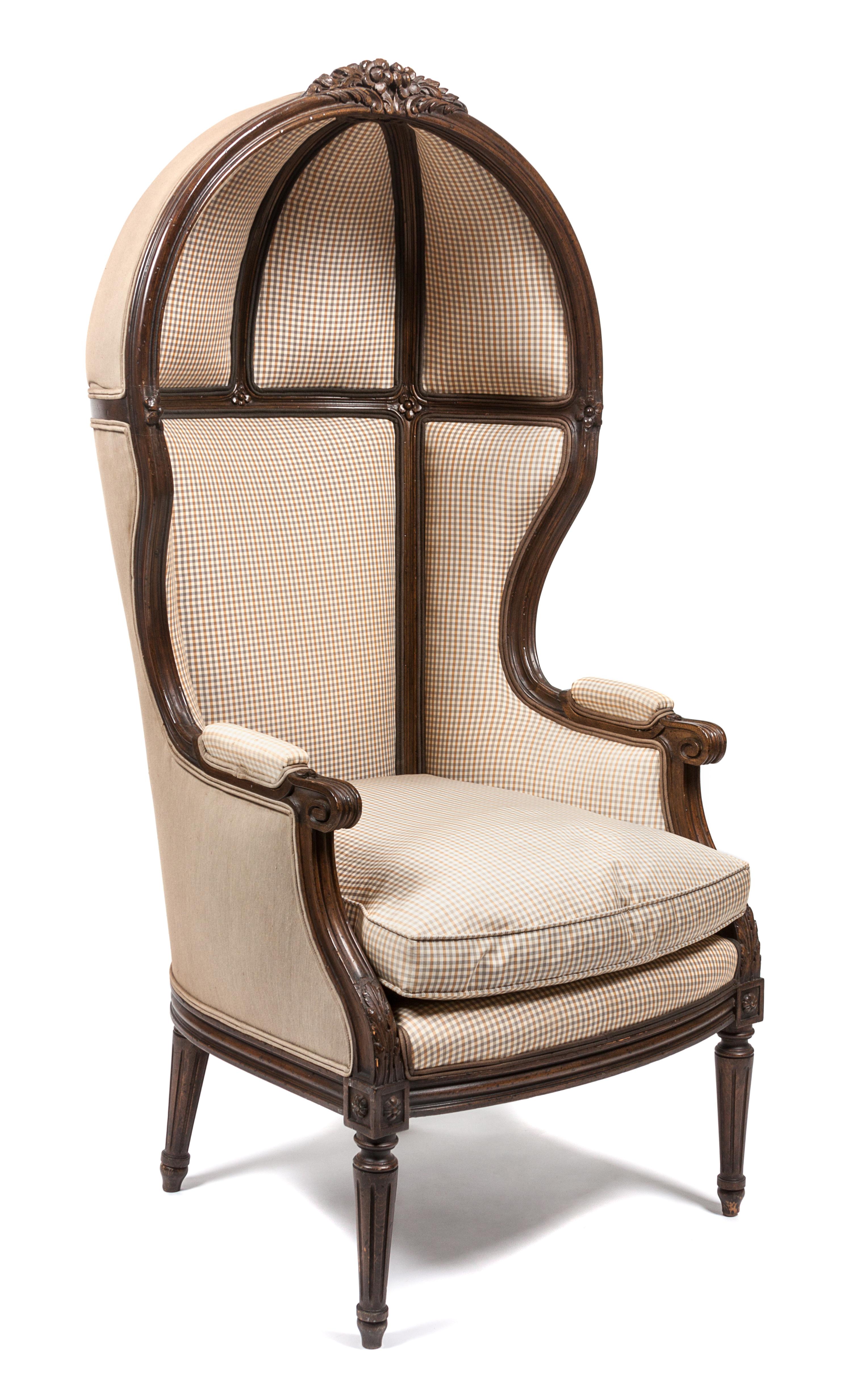 A Louis XVI Style Walnut Porter's Chair Height 55 inches. — 19TH CENTURY