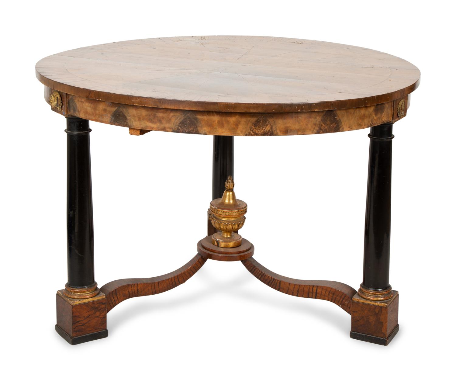 An Empire Style Parcel Ebonized Walnut Center Table — 19TH CENTURY