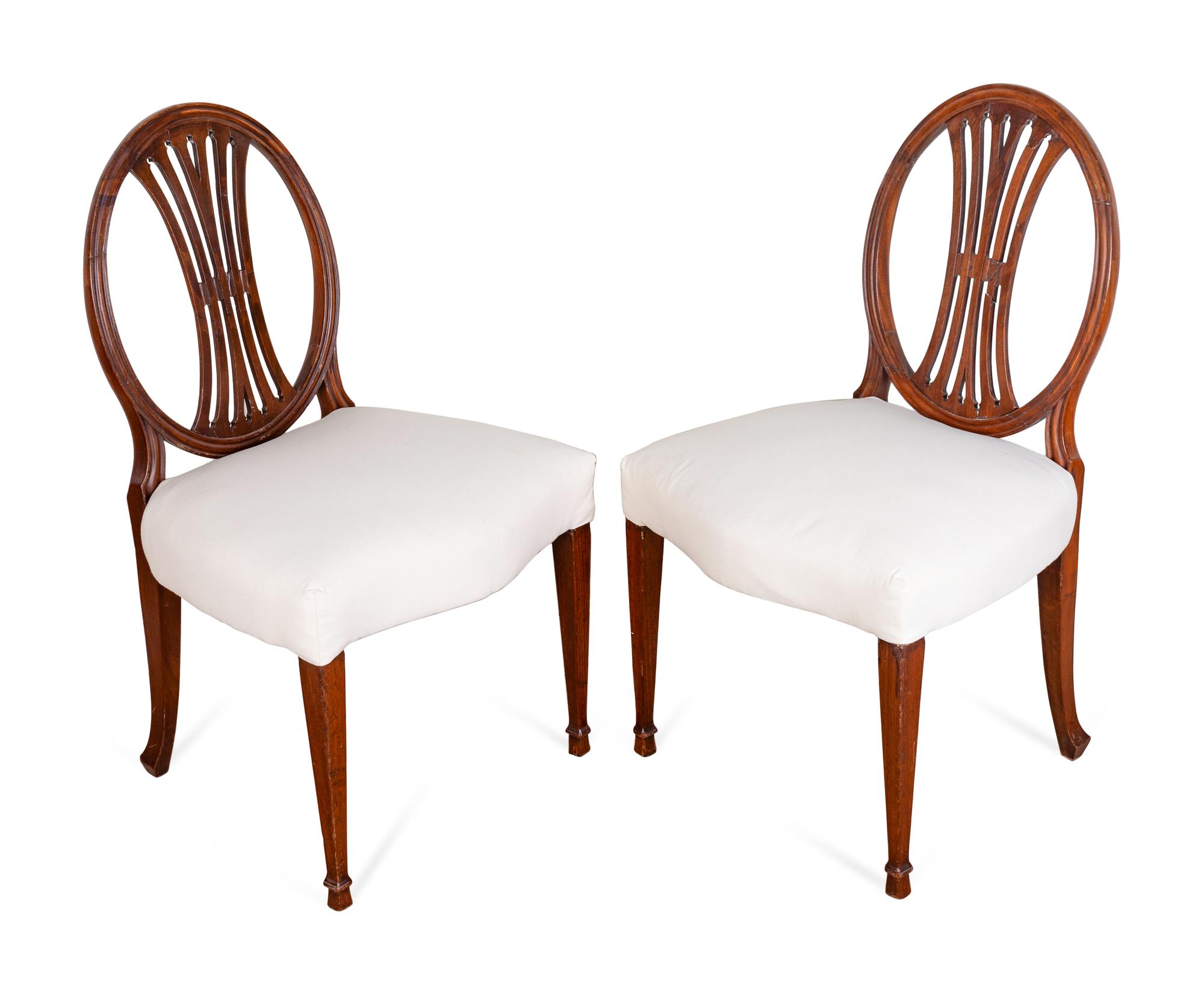 A Set of Six George III Carved Mahogany Dining Chairs and Two Similar Upholstered Back Armchairs — 18TH CENTURY