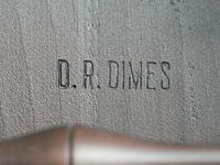 A D.R. Dimes Black-Painted Brace-Back Compass-Seat Windsor Armchair