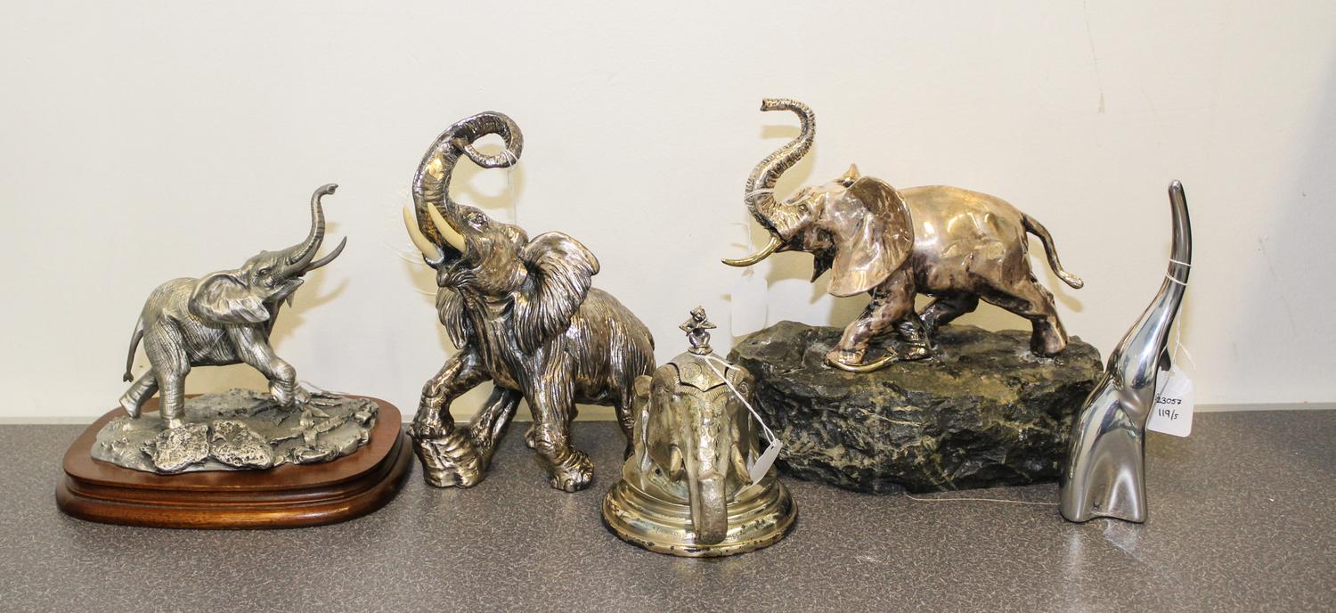 A Group of Five Silvered Metal Elephant Figures Height of tallest 9 1/2 inches.