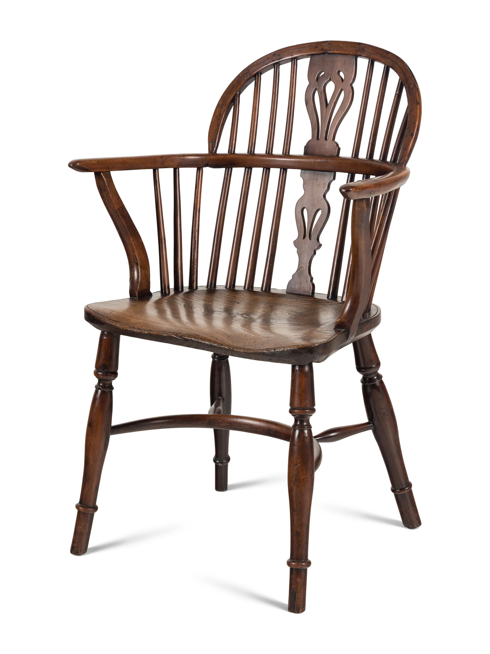 An Assembled Set of Nine Yew, Elm and Beechwood Windsor Armchairs