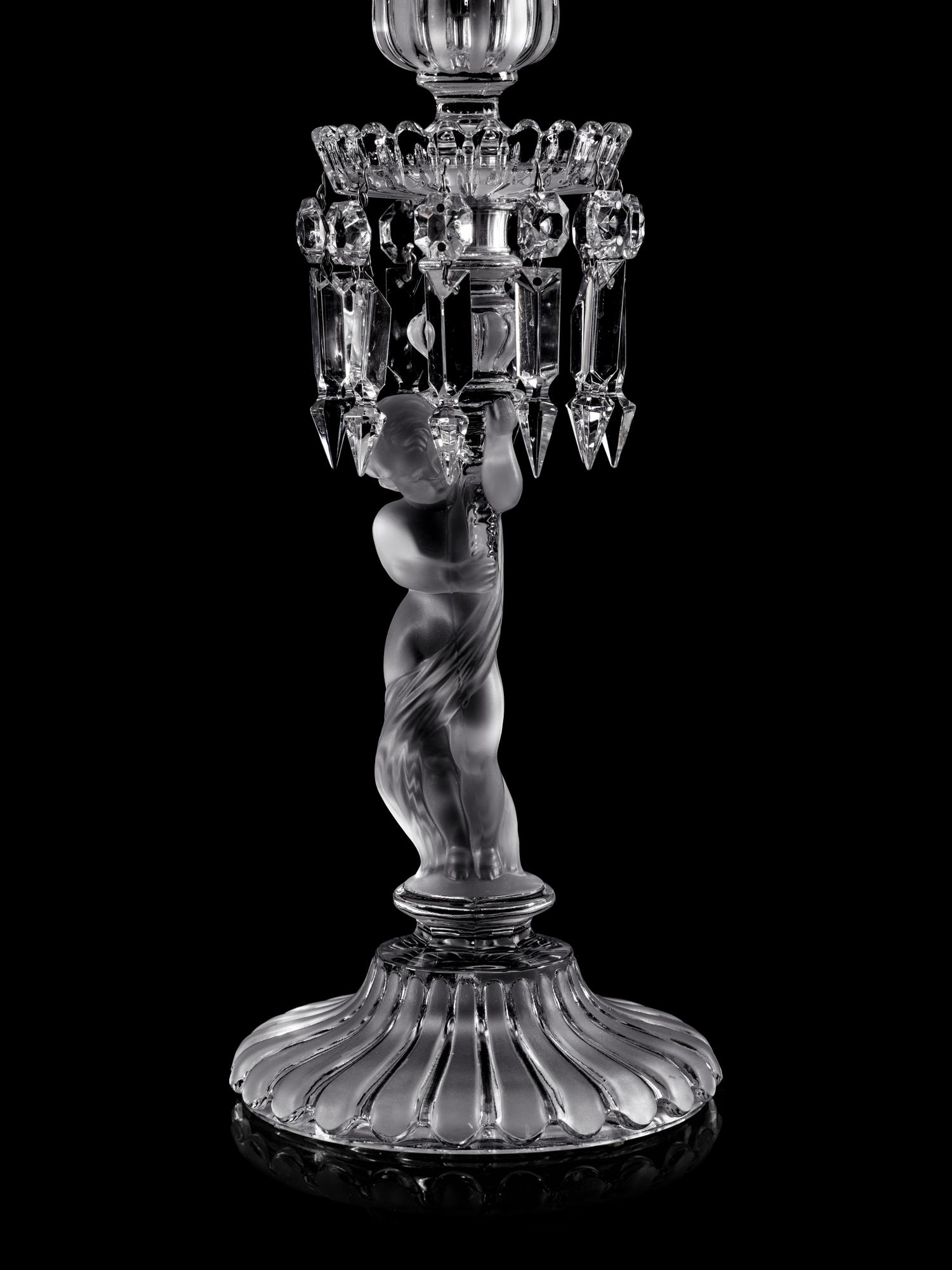 A Pair of Baccarat Glass Figural Candlesticks