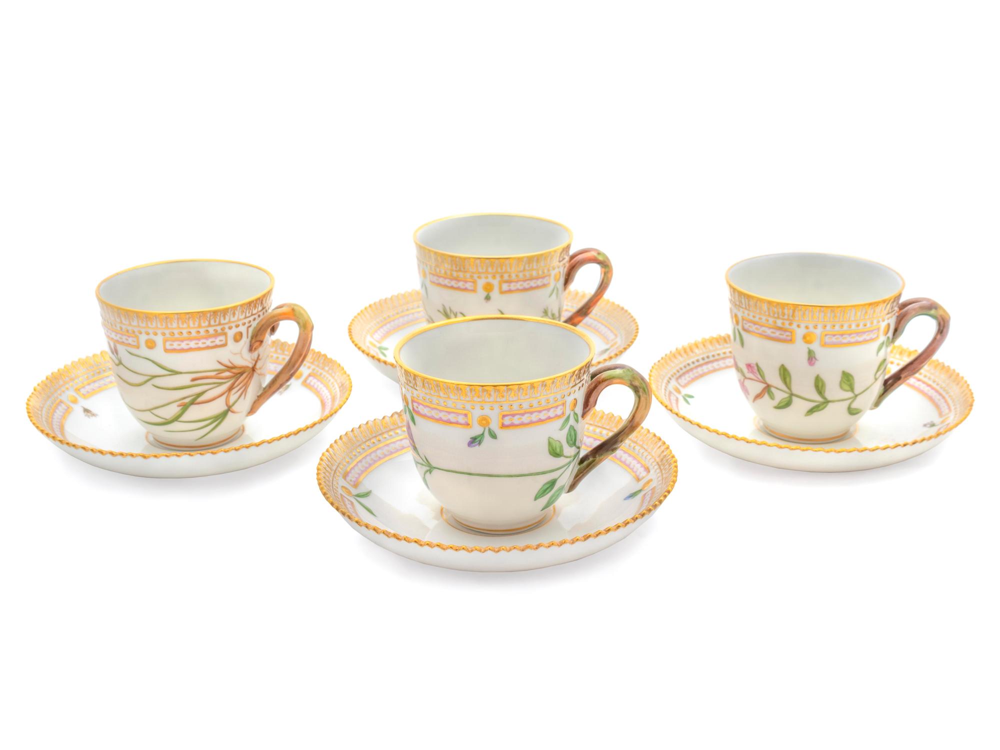 A Group of Four Royal Copenhagen Flora Danica Teacups and Saucers — 20TH CENTURY