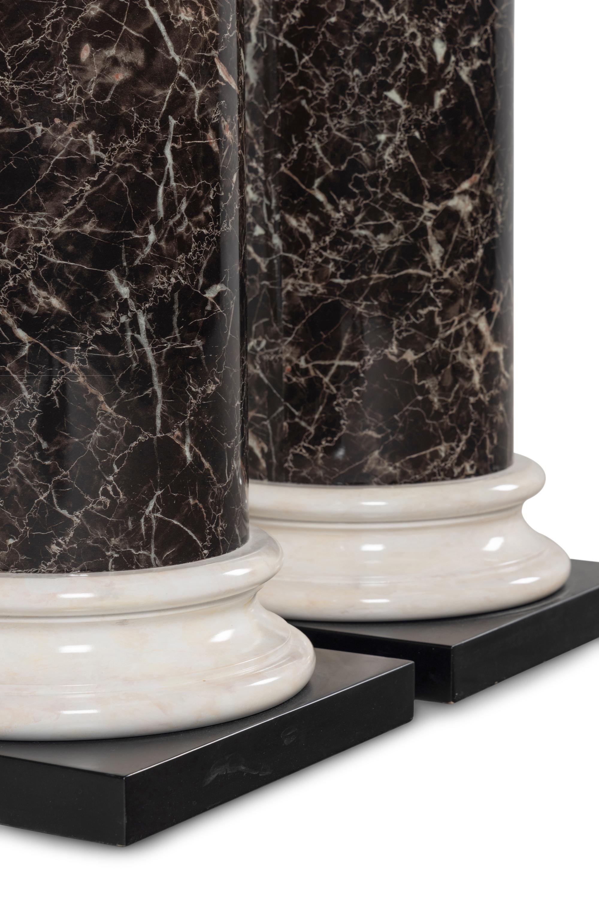 A Pair of Faux Marble Pedestals