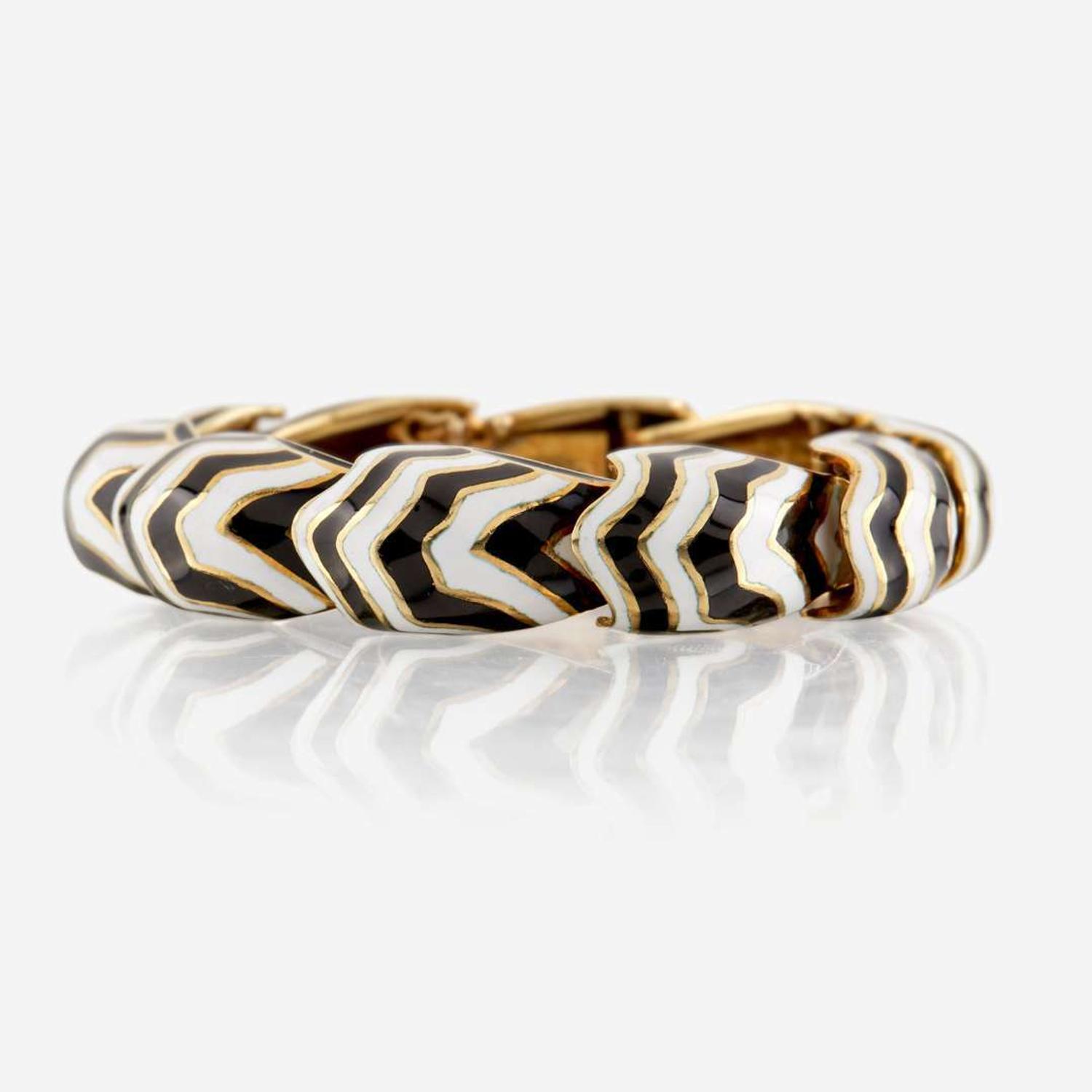 A gold and enamel bracelet