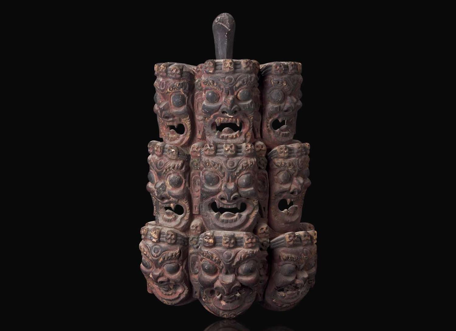 A Nepalese carved and polychromed wood mask 尼泊爾加彩木面具