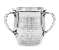An American Silver Trophy Cup of Rowing Interest, Gorham Mfg. Co., Providence, RI, 1897, of Tyg form, the body engraved with a scene of