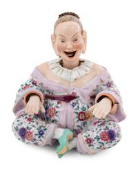 A German Porcelain "Nodder" Figure