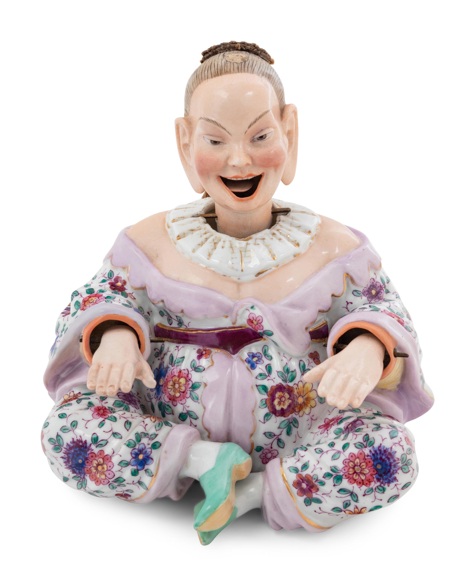 A German Porcelain "Nodder" Figure