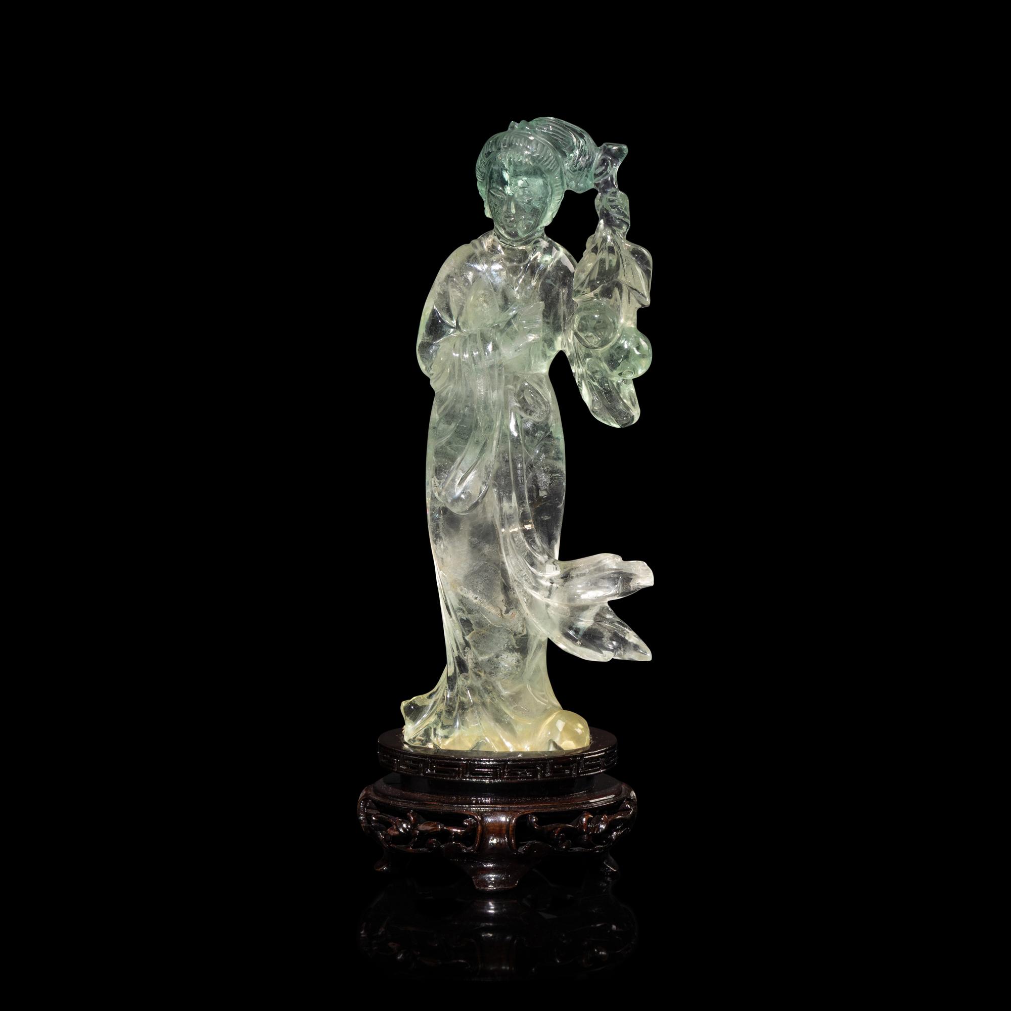 A Chinese Fluorite Standing Figure of a Lady, 20th Century — 近代 萤石刻美人擺件