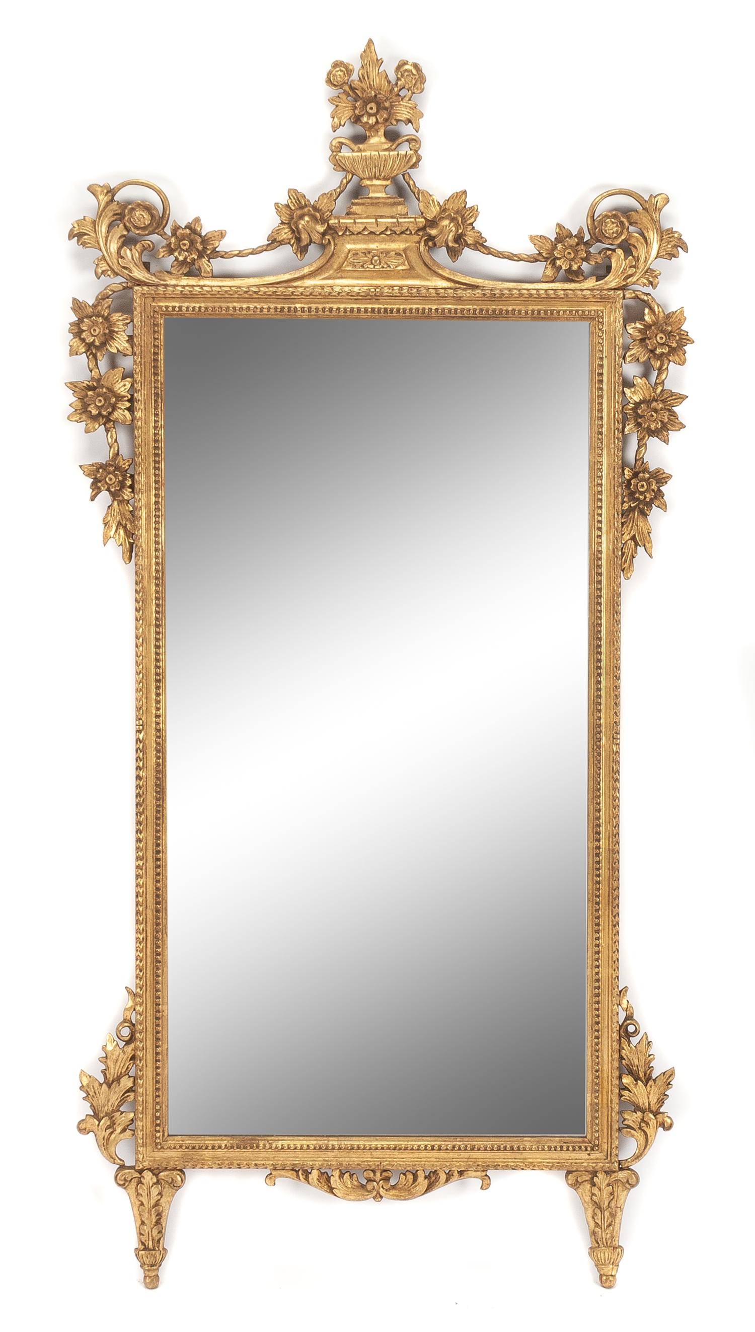 An Italian Giltwood Mirror Height 56 x width 27 1/2 inches. — 19TH CENTURY