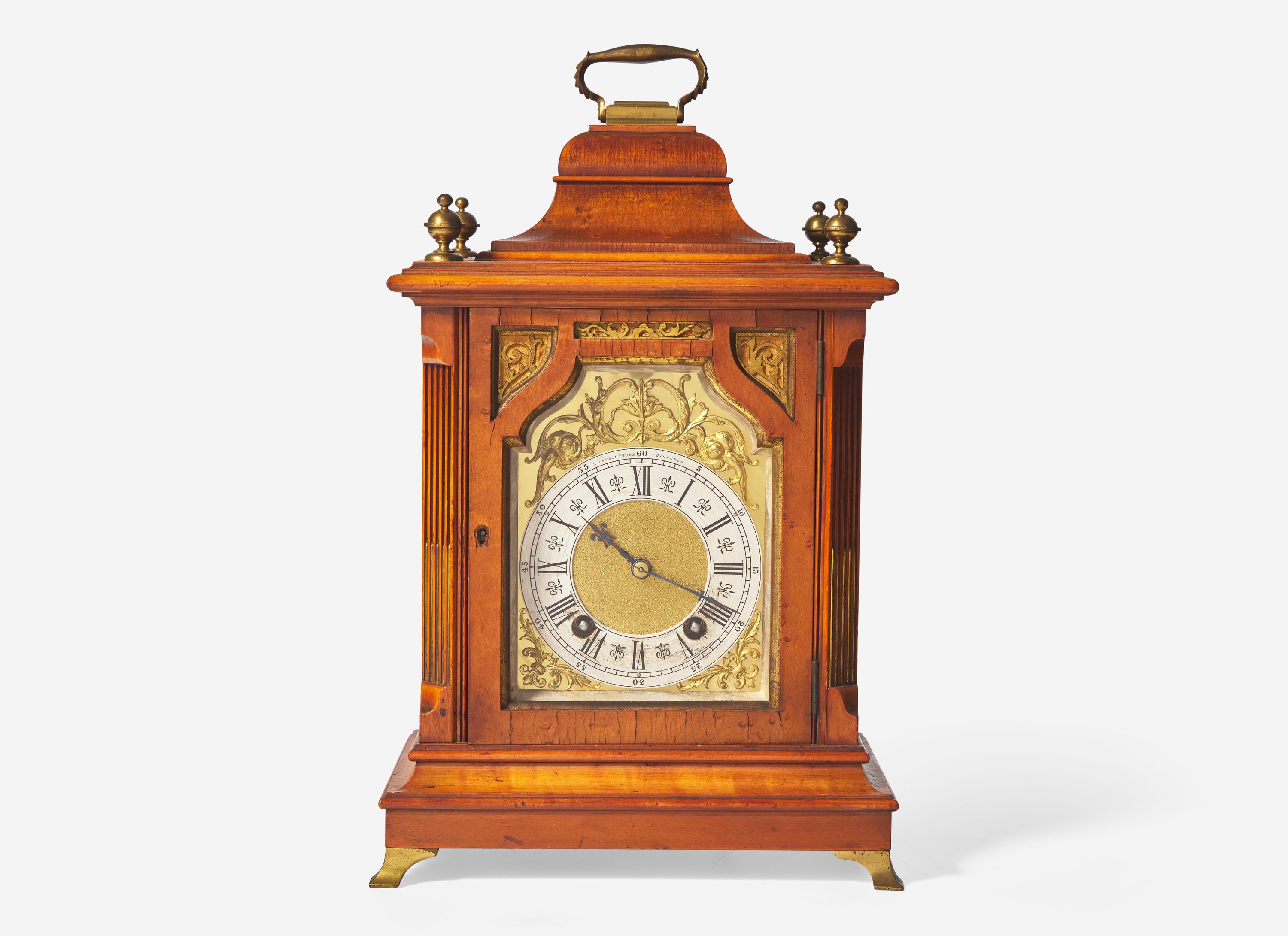 A Scottish Gilt Brass Mounted and Pierce Carved Walnut Mantel Clock