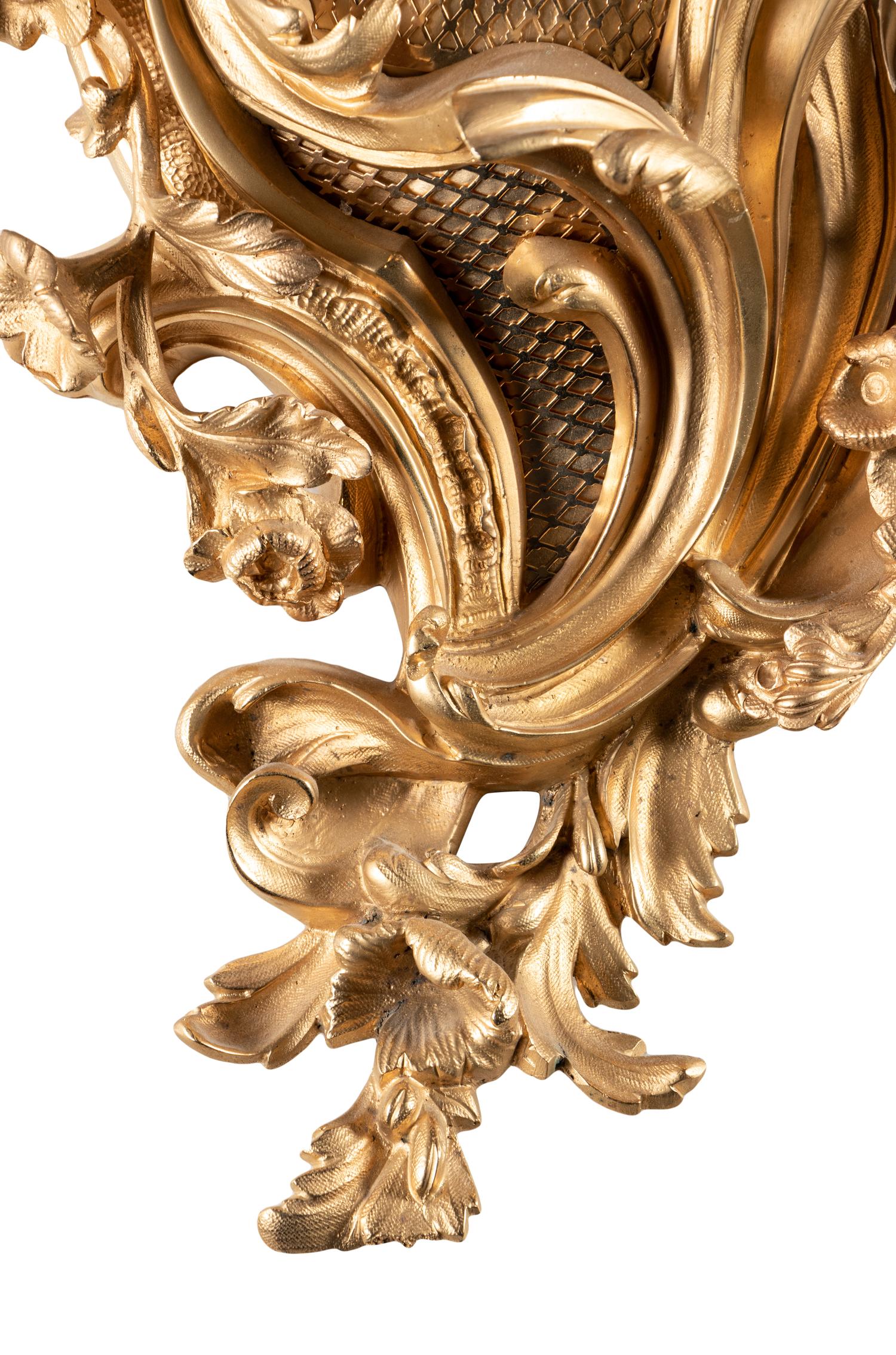 A Louis XV Style Gilt Bronze Cartel Clock