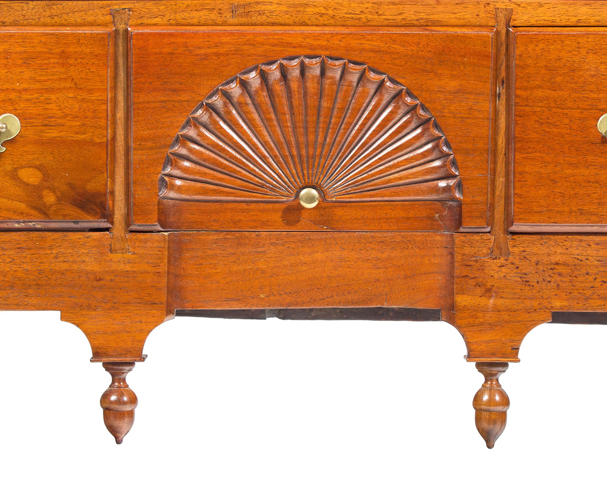 A Queen Anne Carved Walnut Flat-Top High Chest Of Drawers