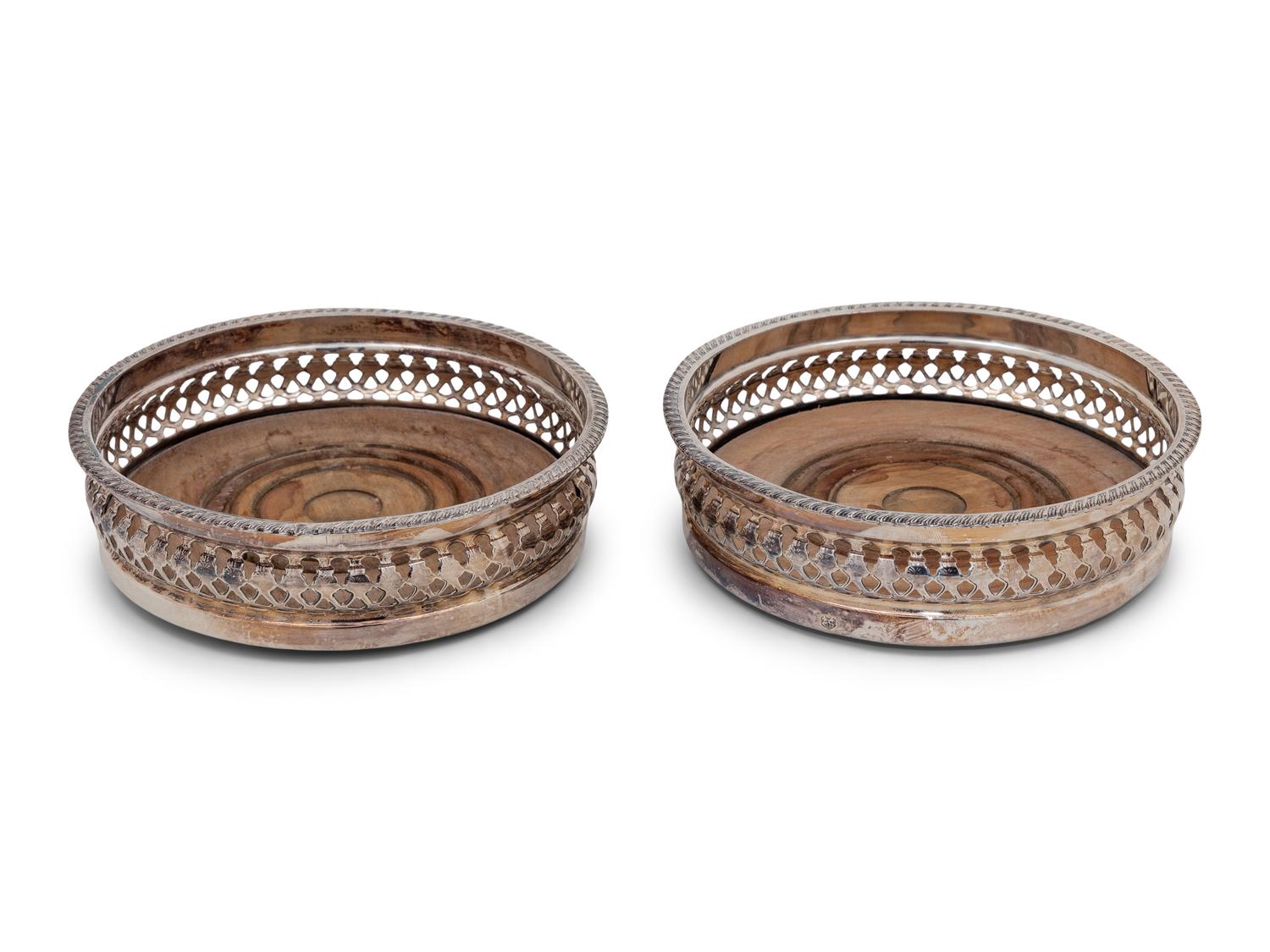 A Pair of Continental Silver-Plate Mounted Wine Coasters