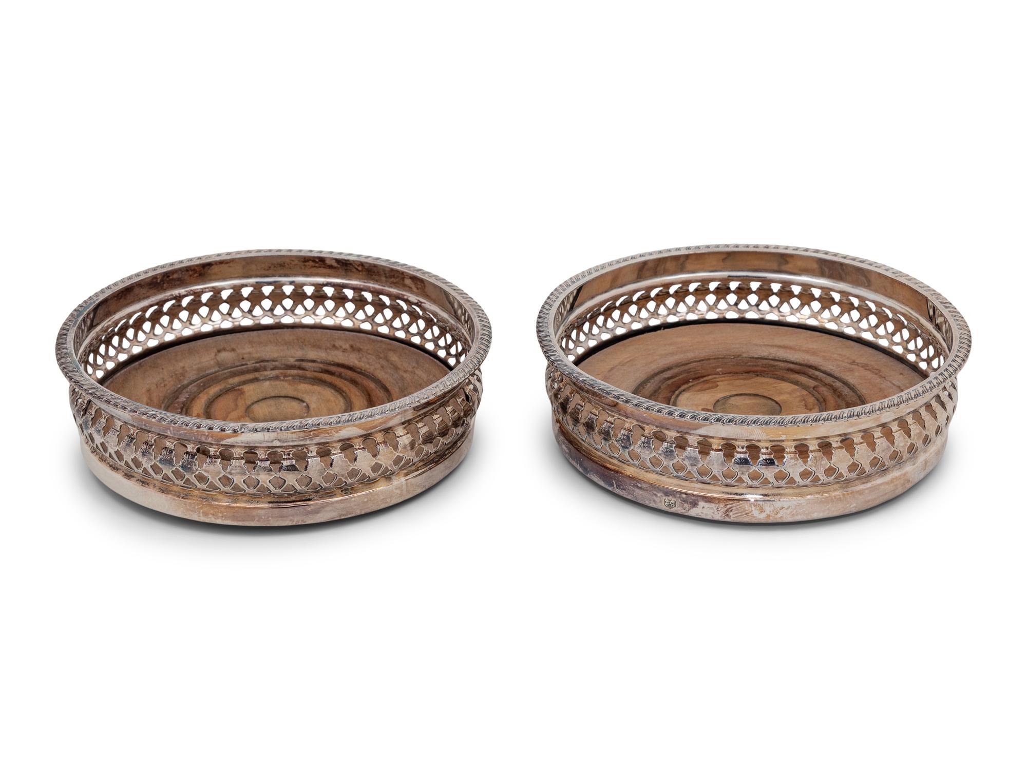 A Pair of Continental Silver-Plate Mounted Wine Coasters