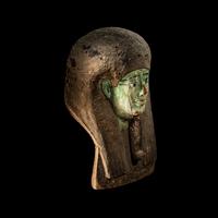 An Egyptian Painted Wood Sarcophagus Head