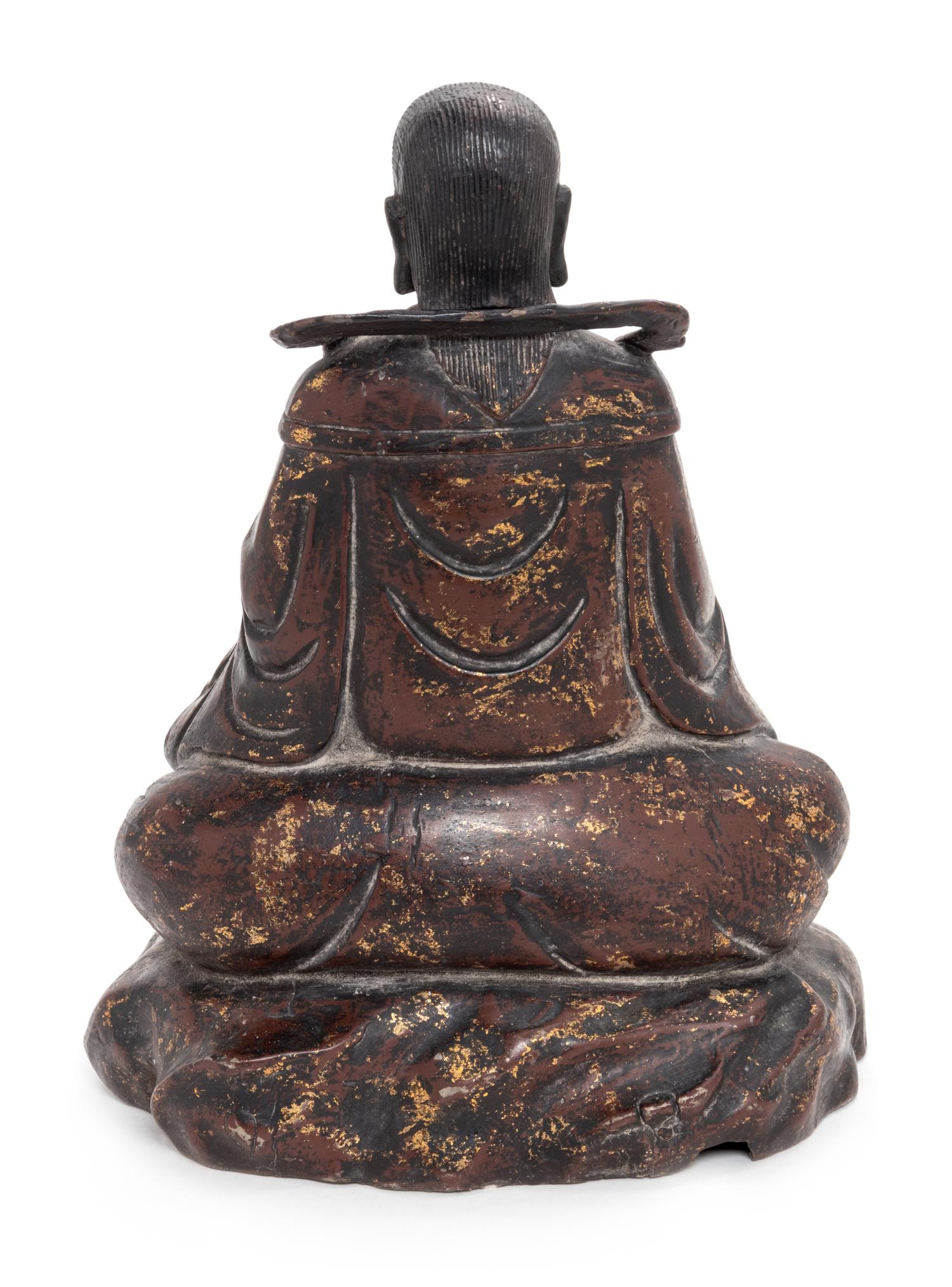 A Gilt Lacquered Bronze Figure of a Daoist Immortal, Zhen Wu Height 10 inches. — MING DYNASTY (1368-1644)