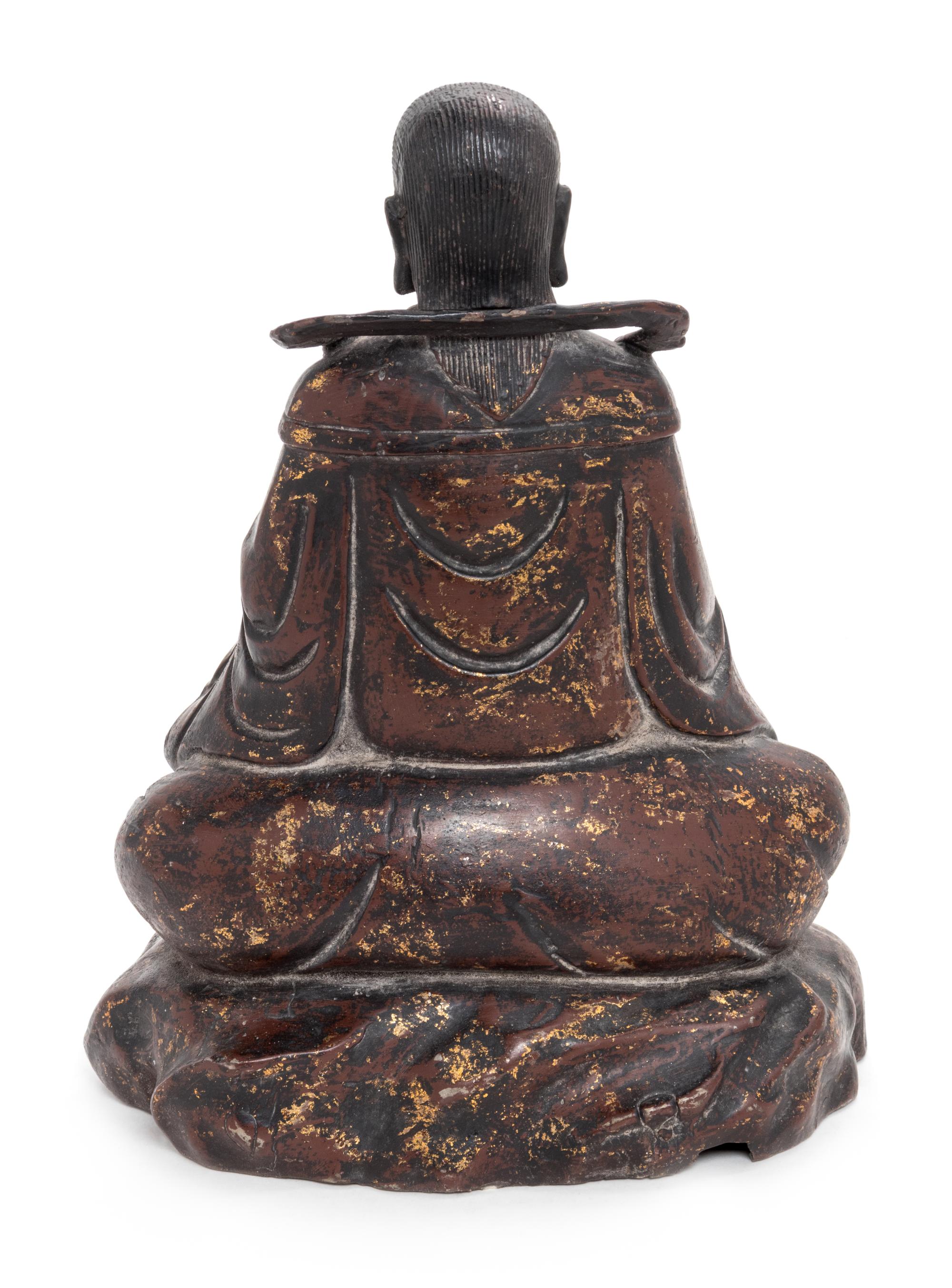 A Gilt Lacquered Bronze Figure of a Daoist Immortal, Zhen Wu Height 10 inches. — MING DYNASTY (1368-1644)